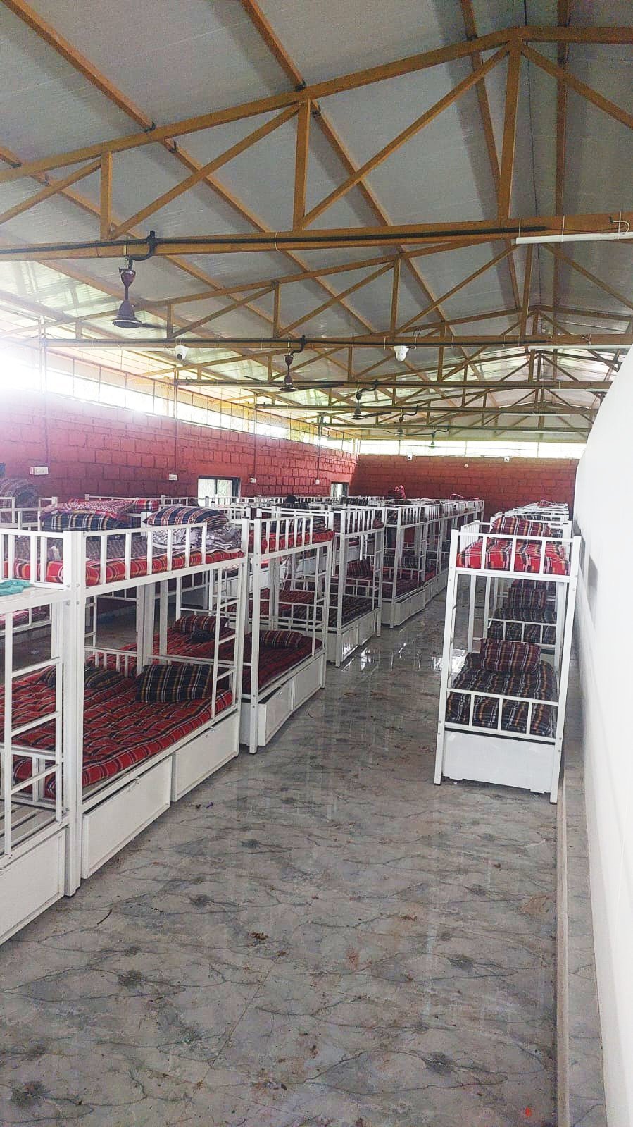 Dormitory with rows of bunk beds at the rehabilitation centre